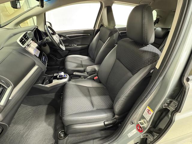 フィットハイブリッド Ｌパッケージ　ナビフルセグＢカメラＥＴＣＬＥＤＡＷ　ナビ＆ＴＶ　地デジフルセグＴＶ　ＵＳＢ　サイドエアバック　ＤＶＤ再生　バックカメラ　オートクルーズコントロール　ＥＳＣ　ＡＵＴＯエアコン　ＡＢＳ　運転席エアバック（29枚目）