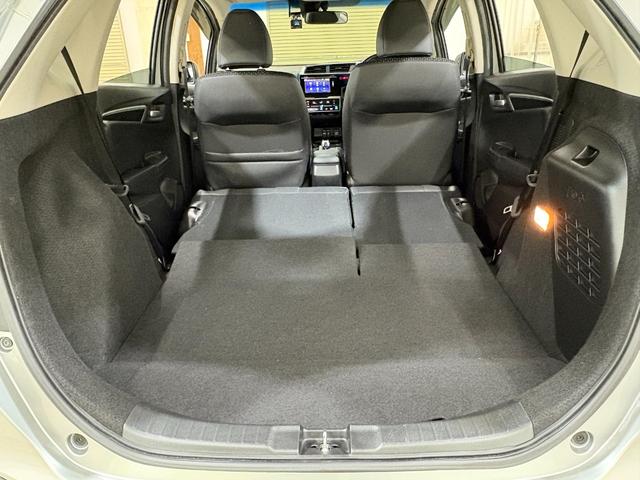 フィットハイブリッド Ｌパッケージ　ナビフルセグＢカメラＥＴＣＬＥＤＡＷ　ナビ＆ＴＶ　地デジフルセグＴＶ　ＵＳＢ　サイドエアバック　ＤＶＤ再生　バックカメラ　オートクルーズコントロール　ＥＳＣ　ＡＵＴＯエアコン　ＡＢＳ　運転席エアバック（33枚目）