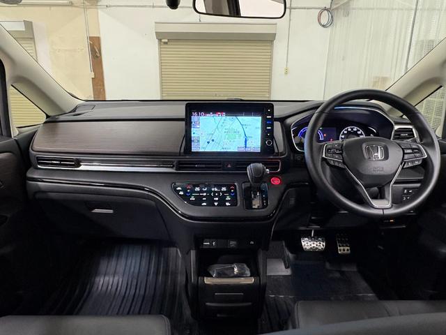 オデッセイハイブリッド e:HEVアブソルート・EX ナビフルセグリアモニターマルチビューカメラETCAWLED 電動Rゲート LEDライト シ-トヒ-タ- 両側PSD パワ-シ-ト 本革シート クルーズコントロール DVD再生機能 3列シート キーレス(3枚目)