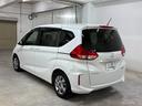 フリードハイブリッド ハイブリッド・Ｇホンダセンシング　ナビフルセグＢカメラＥＴＣＬＥＤ　軽減ブレーキ　キーフリーシステム　１オ－ナ－　記録簿　ＤＶＤ再生可能　サイドカーテンエアバック　禁煙　後カメラ　Ａクルーズ　地デジフルセグＴＶ　ＬＥＤヘッドランプ（2枚目）