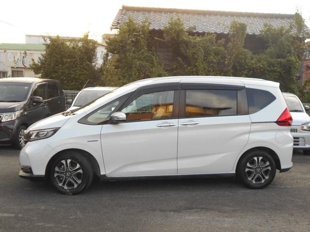 フリードハイブリッド ハイブリッド・クロスターホンダセンシング　ワンオーナー　走行４万キロ　両側電動スライドドア　アダプティブオートクルーズ　６人乗り　社外ナビフルセグＴＶバックカメラ　ＥＴＣ（3枚目）