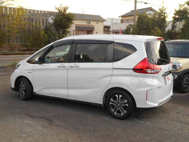 フリードハイブリッド ハイブリッド・クロスターホンダセンシング　ワンオーナー　走行４万キロ　両側電動スライドドア　アダプティブオートクルーズ　６人乗り　社外ナビフルセグＴＶバックカメラ　ＥＴＣ（4枚目）