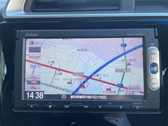 フィット １３Ｇ・Ｆパッケージ　ＥＴＣ　バックカメラ　ナビ　ＴＶ　衝突被害軽減システム　スマートキー　アイドリングストップ　電動格納ミラー　ＣＶＴ　盗難防止システム　衝突安全ボディ　ＡＢＳ　ＥＳＣ　Ｂｌｕｅｔｏｏｔｈ　エアコン（3枚目）