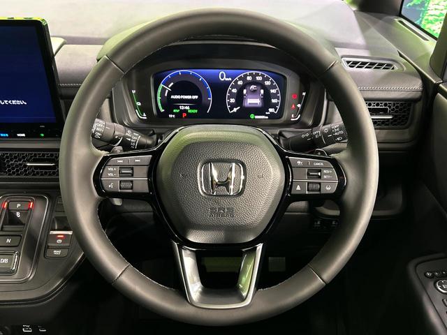 ステップワゴン ｅ：ＨＥＶスパーダ　登録済未使用車　両側電動ドア　バックカメラ　衝突被害軽減システム　レーダークルーズ　電動リアゲート　ハーフレザーシート　コーナーセンサー　スマートキー　ＬＥＤヘッド　オートハイビーム　車線逸脱警報（12枚目）