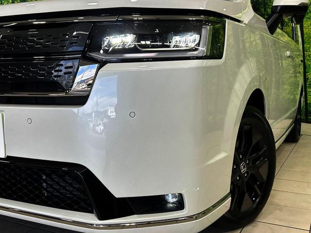 ステップワゴン ｅ：ＨＥＶスパーダ　登録済未使用車　両側電動ドア　バックカメラ　衝突被害軽減システム　レーダークルーズ　電動リアゲート　ハーフレザーシート　コーナーセンサー　スマートキー　ＬＥＤヘッド　オートハイビーム　車線逸脱警報（13枚目）