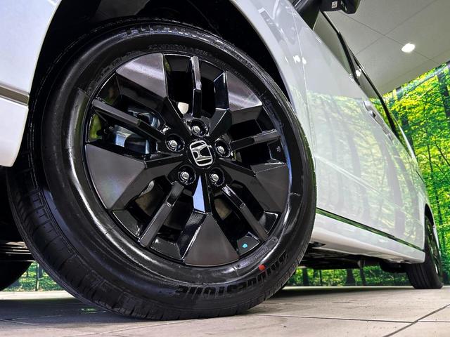 ステップワゴン ｅ：ＨＥＶスパーダ　登録済未使用車　両側電動ドア　バックカメラ　衝突被害軽減システム　レーダークルーズ　電動リアゲート　ハーフレザーシート　コーナーセンサー　スマートキー　ＬＥＤヘッド　オートハイビーム　車線逸脱警報（14枚目）