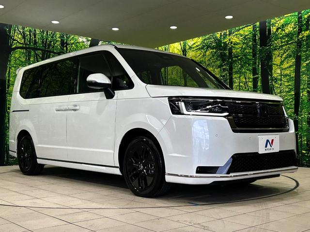 ステップワゴン ｅ：ＨＥＶスパーダ　登録済未使用車　両側電動ドア　バックカメラ　衝突被害軽減システム　レーダークルーズ　電動リアゲート　ハーフレザーシート　コーナーセンサー　スマートキー　ＬＥＤヘッド　オートハイビーム　車線逸脱警報（17枚目）