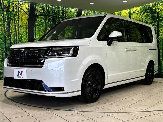 ステップワゴン ｅ：ＨＥＶスパーダ　登録済未使用車　両側電動ドア　バックカメラ　衝突被害軽減システム　レーダークルーズ　電動リアゲート　ハーフレザーシート　コーナーセンサー　スマートキー　ＬＥＤヘッド　オートハイビーム　車線逸脱警報（25枚目）