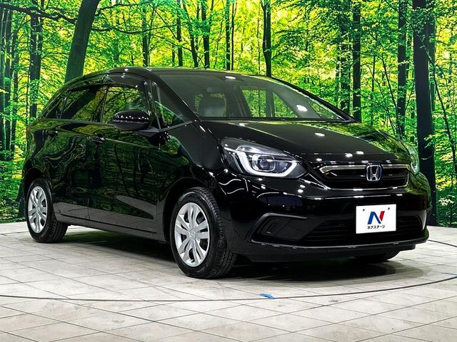 フィット e:HEVホーム 純正8インチナビ バックカメラ ホンダセンシング アダプティブクルーズ 禁煙車 ハーフレザーシート スマートキー LEDヘッド ETC オートライト CD・DVD再生 Bluetooth(16枚目)