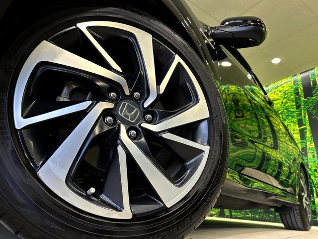 ヴェゼル ハイブリッドＲＳ・ホンダセンシング　バックカメラ　衝突被害軽減システム　禁煙車　ハーフレザーシート　ドラレコ　スマートキー　ＬＥＤヘッド　ビルトインＥＴＣ　純正１８インチアルミ　車線逸脱警報　オートライト　デュアルエアコン（13枚目）