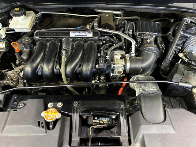 ヴェゼル ハイブリッドＲＳ・ホンダセンシング　バックカメラ　衝突被害軽減システム　禁煙車　ハーフレザーシート　ドラレコ　スマートキー　ＬＥＤヘッド　ビルトインＥＴＣ　純正１８インチアルミ　車線逸脱警報　オートライト　デュアルエアコン（18枚目）