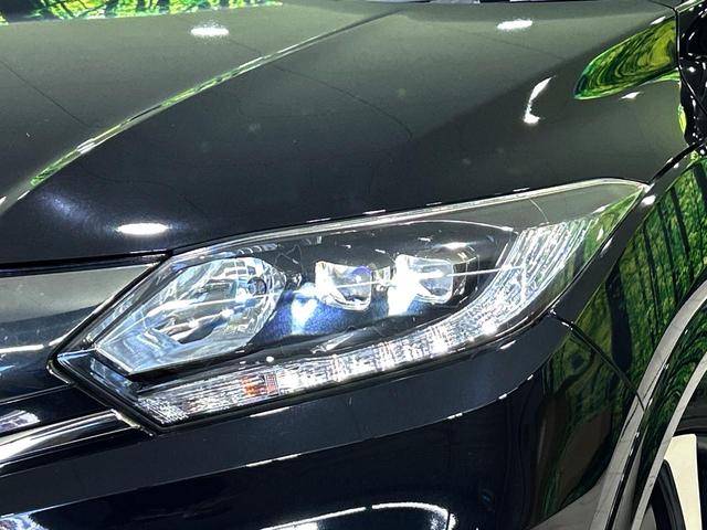 ヴェゼル ハイブリッドＲＳ・ホンダセンシング　バックカメラ　衝突被害軽減システム　禁煙車　ハーフレザーシート　ドラレコ　スマートキー　ＬＥＤヘッド　ビルトインＥＴＣ　純正１８インチアルミ　車線逸脱警報　オートライト　デュアルエアコン（21枚目）