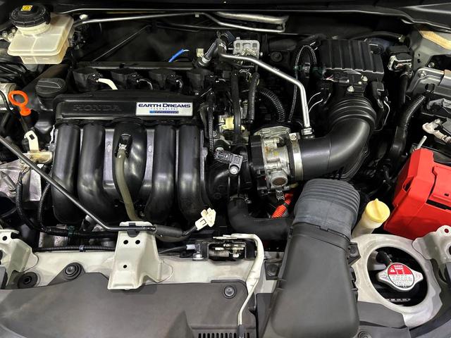 フィットハイブリッド Ｌパッケージ　純正ナビ　シティブレーキアクティブシステム　バックカメラ　禁煙車　ＬＥＤヘッド　ＥＴＣ　クルーズコントロール　オートライト　オートエアコン　Ｂｌｕｅｔｏｏｔｈ　ＣＤ　ＤＶＤ再生（18枚目）