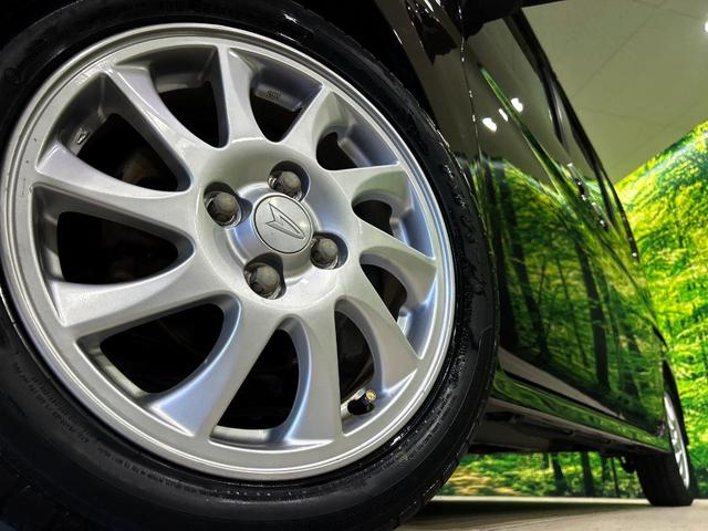 タント カスタムRS ターボ 電動スライドドア 禁煙車 スマートキー HIDヘッド 純正15インチアルミ オートエアコン CD 電動格納ミラー(13枚目)