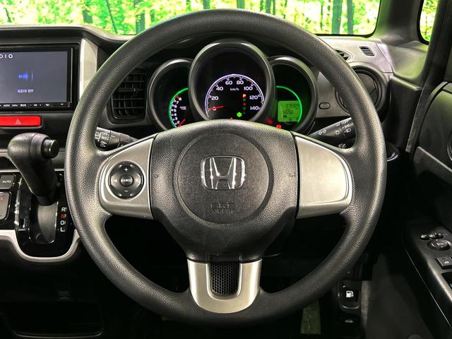 Ｎ－ＢＯＸ Ｇ・Ｌパッケージ　電動スライドドア　ＳＤナビ　バックカメラ　禁煙車　スマートキー　ＥＴＣ　オートエアコン　ＣＤ　ＤＶＤ再生　フルセグ　ロールシェード　電動格納ミラー　ドアバイザー　ベンチシート（11枚目）