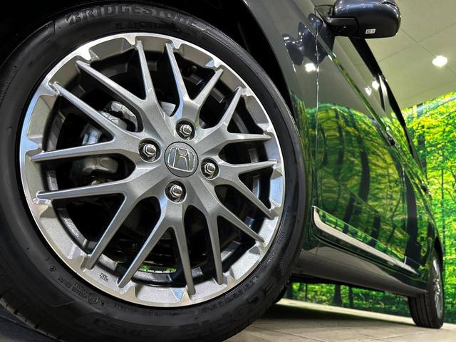 N-ONE プレミアム ツアラー 純正SDナビ バックカメラ 衝突被害軽減システム 禁煙車 ハーフレザーシート コーナーセンサー スマートキー LEDヘッド 純正15インチアルミ 車線逸脱警報 オートライト オートエアコン(13枚目)