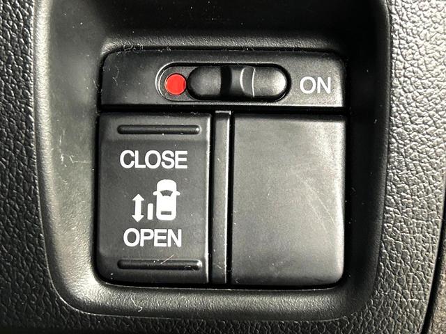 N-BOXカスタム G・Lパッケージ 電動スライドドア 純正SDナビ バックカメラ 禁煙車 スマートキー HIDヘッド ビルトインETC 純正14インチアルミ オートライト オートエアコン CD DVD再生 フルセグ(5枚目)