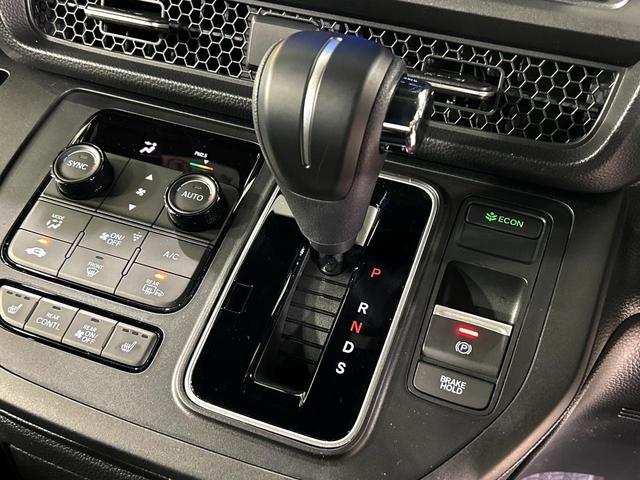 ステップワゴン スパーダ　登録済未使用車　純正１１．４インチナビ　ホンダセンシング　アダプティブクルーズ　両側電動スライドドア　バックカメラ　ブラインドスポットモニター　電動リアゲート　シートヒーター　オットマン　７人乗り（48枚目）