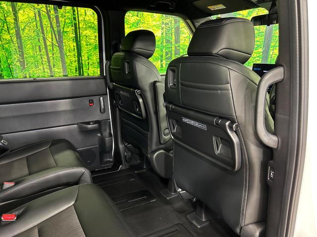 ステップワゴン スパーダ　登録済未使用車　純正１１．４インチナビ　ホンダセンシング　アダプティブクルーズ　両側電動スライドドア　バックカメラ　ブラインドスポットモニター　電動リアゲート　シートヒーター　オットマン　７人乗り（63枚目）