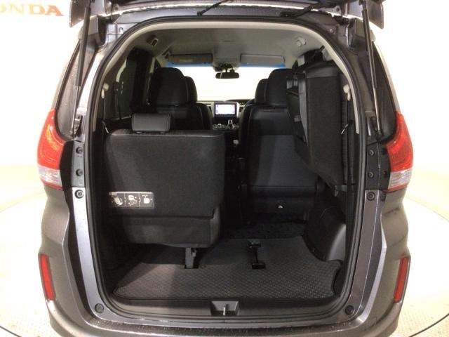 フリードハイブリッド ハイブリッド・Ｇホンダセンシング　１年保証　ワンオーナー　ナビＶＸＭ－１７５ＶＦＮＩ　ＴＶ　Ｒカメラ　ＣＤ録音　ＤＶＤ　ドラレコ　ＥＴＣ　ＬＥＤライト　ＶＳＡ　両側電動ドア　クルコン　アルミ　スマートキー　盗難防止装置　整備記録簿（34枚目）