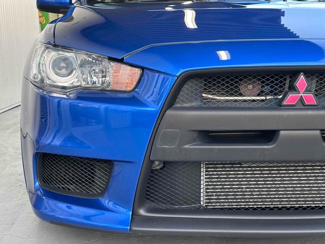 ランサー ＧＳＲエボリューションＸ　フロア５速ＭＴ　ＲＥＣＡＲＯシート　ｂｒｅｍｂｏキャリパー　ＴＥＩＮ車高調　減衰力コントローラー　大型Ｒスポイラー　純正１８インチＡＷ　ナビ＆ＴＶ　ＥＴＣ２．０　ＡＷＣ　ＨＩＤライト　スマートキー（22枚目）