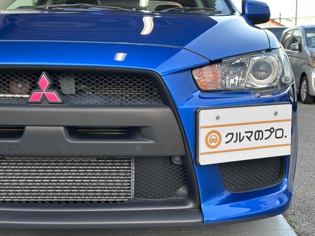 ランサー ＧＳＲエボリューションＸ　フロア５速ＭＴ　ＲＥＣＡＲＯシート　ｂｒｅｍｂｏキャリパー　ＴＥＩＮ車高調　減衰力コントローラー　大型Ｒスポイラー　純正１８インチＡＷ　ナビ＆ＴＶ　ＥＴＣ２．０　ＡＷＣ　ＨＩＤライト　スマートキー（23枚目）