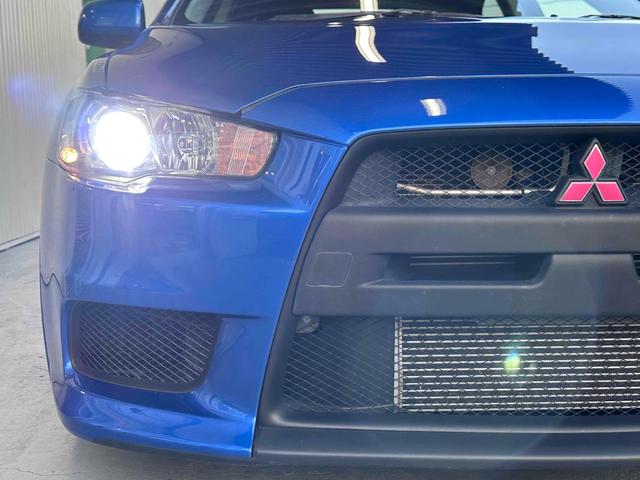 ランサー ＧＳＲエボリューションＸ　フロア５速ＭＴ　ＲＥＣＡＲＯシート　ｂｒｅｍｂｏキャリパー　ＴＥＩＮ車高調　減衰力コントローラー　大型Ｒスポイラー　純正１８インチＡＷ　ナビ＆ＴＶ　ＥＴＣ２．０　ＡＷＣ　ＨＩＤライト　スマートキー（24枚目）