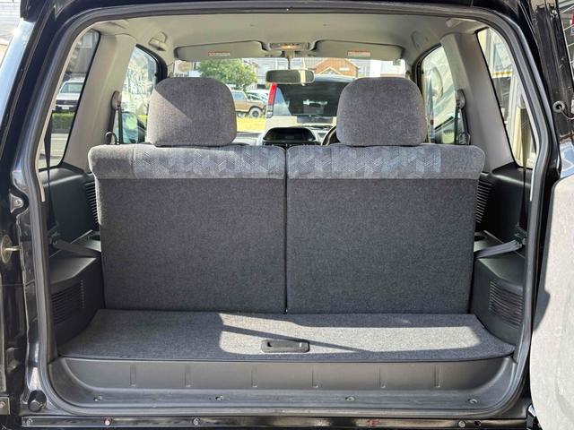 パジェロイオ ＺＲ　ブラックアウト　インナーブラック　車検Ｒ９年１０月　リアスポイラー　背面タイヤ　ＭＧ１５インチブラックＡＷ　ケンウッドオーディオ　ＡＵＸ　ＵＳＢ　オートエアコン　フロントフォグライト（12枚目）