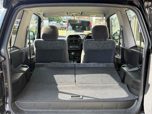 パジェロイオ ＺＲ　ブラックアウト　インナーブラック　車検Ｒ９年１０月　リアスポイラー　背面タイヤ　ＭＧ１５インチブラックＡＷ　ケンウッドオーディオ　ＡＵＸ　ＵＳＢ　オートエアコン　フロントフォグライト（13枚目）