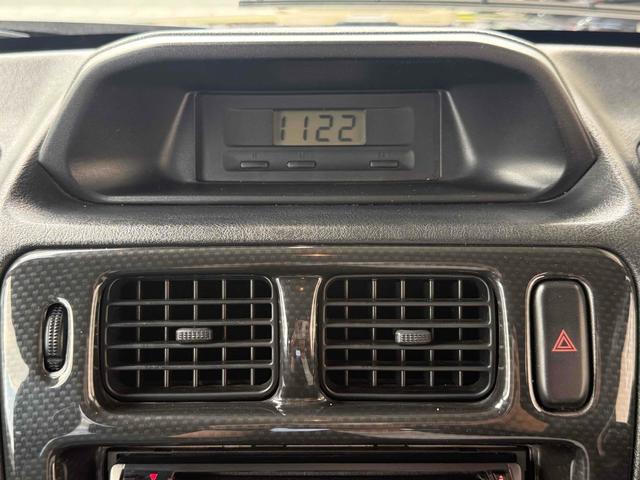 パジェロイオ ＺＲ　ブラックアウト　インナーブラック　車検Ｒ９年１０月　リアスポイラー　背面タイヤ　ＭＧ１５インチブラックＡＷ　ケンウッドオーディオ　ＡＵＸ　ＵＳＢ　オートエアコン　フロントフォグライト（19枚目）