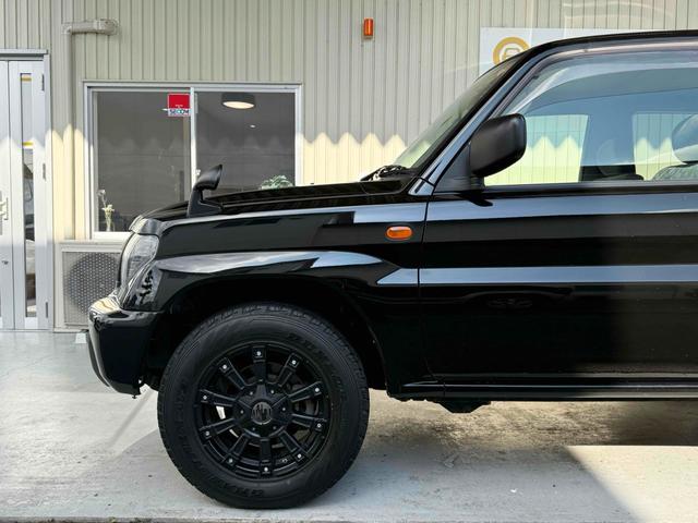 パジェロイオ ＺＲ　ブラックアウト　インナーブラック　車検Ｒ９年１０月　リアスポイラー　背面タイヤ　ＭＧ１５インチブラックＡＷ　ケンウッドオーディオ　ＡＵＸ　ＵＳＢ　オートエアコン　フロントフォグライト（26枚目）