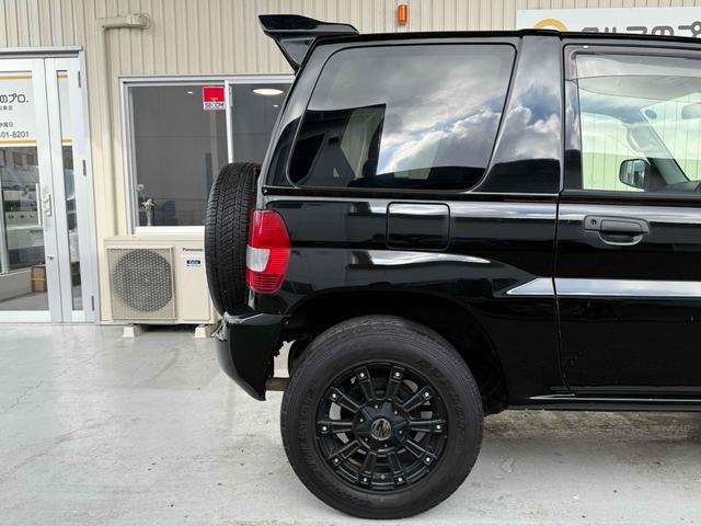 パジェロイオ ＺＲ　ブラックアウト　インナーブラック　車検Ｒ９年１０月　リアスポイラー　背面タイヤ　ＭＧ１５インチブラックＡＷ　ケンウッドオーディオ　ＡＵＸ　ＵＳＢ　オートエアコン　フロントフォグライト（32枚目）