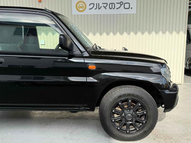 パジェロイオ ＺＲ　ブラックアウト　インナーブラック　車検Ｒ９年１０月　リアスポイラー　背面タイヤ　ＭＧ１５インチブラックＡＷ　ケンウッドオーディオ　ＡＵＸ　ＵＳＢ　オートエアコン　フロントフォグライト（33枚目）