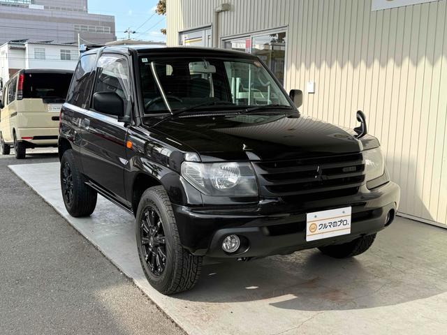 パジェロイオ ＺＲ　ブラックアウト　インナーブラック　車検Ｒ９年１０月　リアスポイラー　背面タイヤ　ＭＧ１５インチブラックＡＷ　ケンウッドオーディオ　ＡＵＸ　ＵＳＢ　オートエアコン　フロントフォグライト（34枚目）