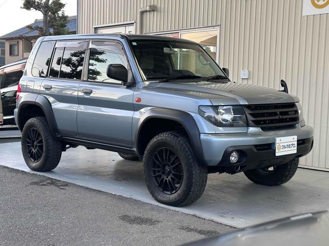 パジェロイオ パールパッケージＩＩ　ナビエディション　１．５インチリフトアップ　ブラックアウト　オーバーフェンダー　社外１６インチＡＷ　インナーブラック　Ｆフォグランプ　背面タイヤ　純正モニター　ＥＴＣ　ＡＡＣ　ＰＳ　ＰＷ　分割可倒式Ｒシート　電格ミラー（12枚目）