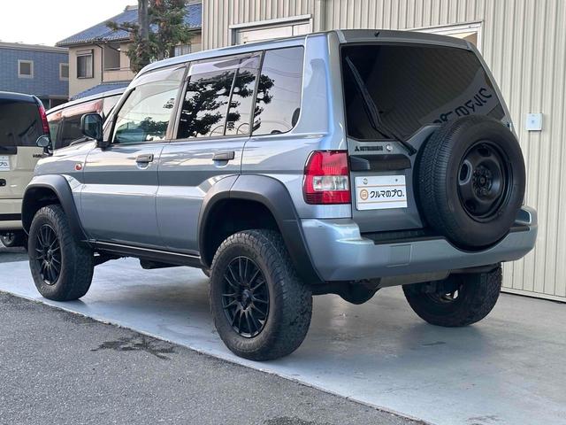 パジェロイオ パールパッケージＩＩ　ナビエディション　１．５インチリフトアップ　ブラックアウト　オーバーフェンダー　社外１６インチＡＷ　インナーブラック　Ｆフォグランプ　背面タイヤ　純正モニター　ＥＴＣ　ＡＡＣ　ＰＳ　ＰＷ　分割可倒式Ｒシート　電格ミラー（16枚目）