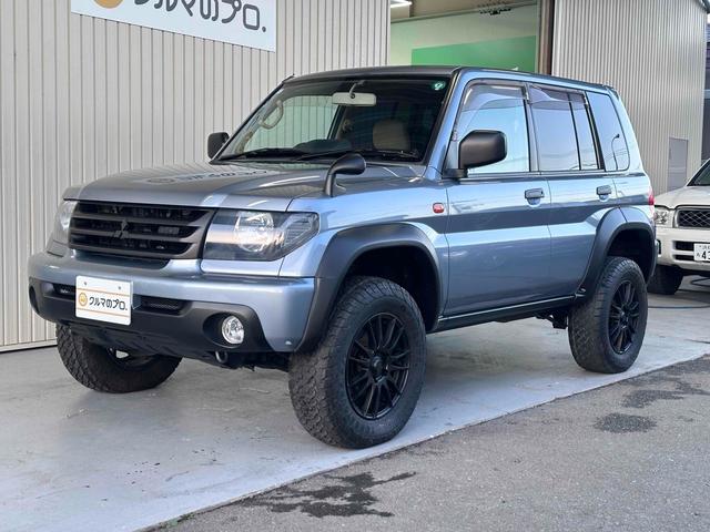 パジェロイオ パールパッケージＩＩ　ナビエディション　１．５インチリフトアップ　ブラックアウト　オーバーフェンダー　社外１６インチＡＷ　インナーブラック　Ｆフォグランプ　背面タイヤ　純正モニター　ＥＴＣ　ＡＡＣ　ＰＳ　ＰＷ　分割可倒式Ｒシート　電格ミラー（21枚目）