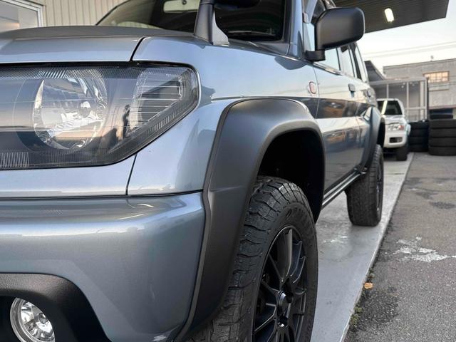 パジェロイオ パールパッケージＩＩ　ナビエディション　１．５インチリフトアップ　ブラックアウト　オーバーフェンダー　社外１６インチＡＷ　インナーブラック　Ｆフォグランプ　背面タイヤ　純正モニター　ＥＴＣ　ＡＡＣ　ＰＳ　ＰＷ　分割可倒式Ｒシート　電格ミラー（25枚目）