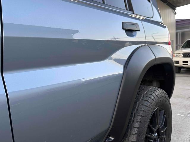 パジェロイオ パールパッケージＩＩ　ナビエディション　１．５インチリフトアップ　ブラックアウト　オーバーフェンダー　社外１６インチＡＷ　インナーブラック　Ｆフォグランプ　背面タイヤ　純正モニター　ＥＴＣ　ＡＡＣ　ＰＳ　ＰＷ　分割可倒式Ｒシート　電格ミラー（26枚目）