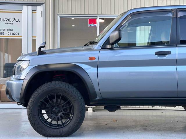 パジェロイオ パールパッケージＩＩ　ナビエディション　１．５インチリフトアップ　ブラックアウト　オーバーフェンダー　社外１６インチＡＷ　インナーブラック　Ｆフォグランプ　背面タイヤ　純正モニター　ＥＴＣ　ＡＡＣ　ＰＳ　ＰＷ　分割可倒式Ｒシート　電格ミラー（29枚目）