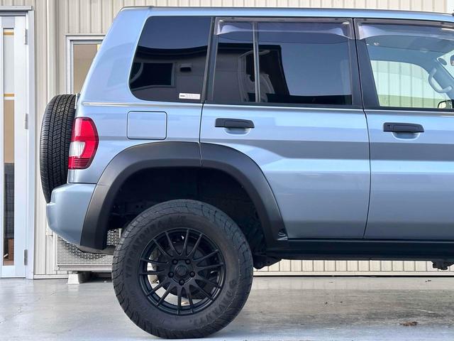 パジェロイオ パールパッケージＩＩ　ナビエディション　１．５インチリフトアップ　ブラックアウト　オーバーフェンダー　社外１６インチＡＷ　インナーブラック　Ｆフォグランプ　背面タイヤ　純正モニター　ＥＴＣ　ＡＡＣ　ＰＳ　ＰＷ　分割可倒式Ｒシート　電格ミラー（31枚目）