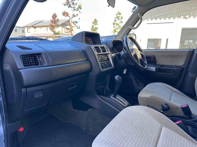 パジェロイオ パールパッケージＩＩ　ナビエディション　１．５インチリフトアップ　ブラックアウト　オーバーフェンダー　社外１６インチＡＷ　インナーブラック　Ｆフォグランプ　背面タイヤ　純正モニター　ＥＴＣ　ＡＡＣ　ＰＳ　ＰＷ　分割可倒式Ｒシート　電格ミラー（36枚目）