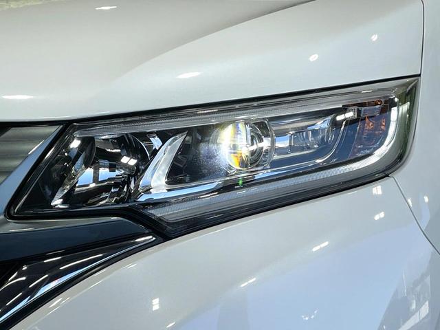 フリード Ｇ・ホンダセンシング　フリップダウン　両側電動ドア　純正ナビ　バックカメラ　衝突被害軽減　レーダークルーズ　禁煙車　コーナーセンサー　スマートキー　ＬＥＤヘッド　ＥＴＣ　車線逸脱警報　オートライト　オートエアコン（13枚目）