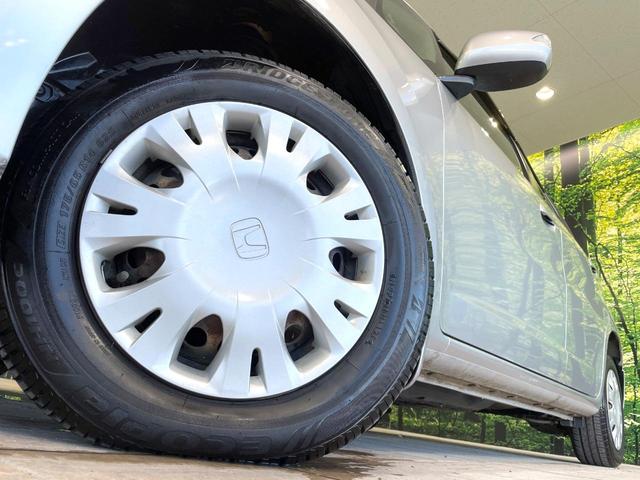 フィット 13G 禁煙車 ワンオーナー CDオーディオ 電動格納ミラー キーレス プライバシーガラス ドアバイザー 盗難防止装置(13枚目)