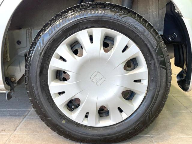 フィット 13G 禁煙車 ワンオーナー CDオーディオ 電動格納ミラー キーレス プライバシーガラス ドアバイザー 盗難防止装置(27枚目)