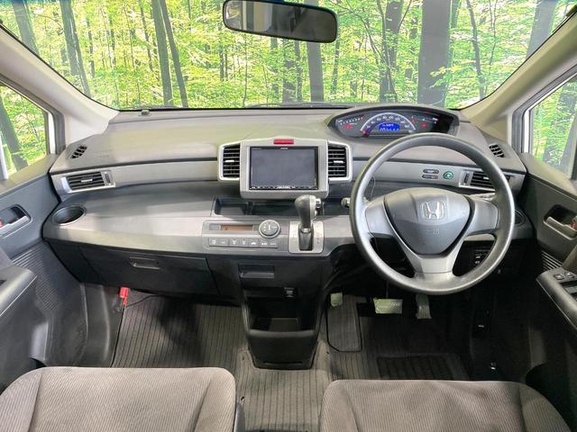 フリード G ジャストセレクション 後席モニター 電動スライドドア 禁煙車 ETC オートライト オートエアコン HIDヘッド 横滑防止装置 プライバシーガラス 盗難防止装置 キーレス(2枚目)