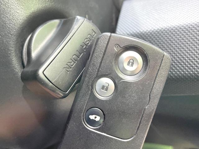 フリード G ジャストセレクション 後席モニター 電動スライドドア 禁煙車 ETC オートライト オートエアコン HIDヘッド 横滑防止装置 プライバシーガラス 盗難防止装置 キーレス(5枚目)