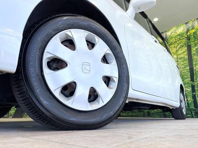 フリード G ジャストセレクション 後席モニター 電動スライドドア 禁煙車 ETC オートライト オートエアコン HIDヘッド 横滑防止装置 プライバシーガラス 盗難防止装置 キーレス(14枚目)