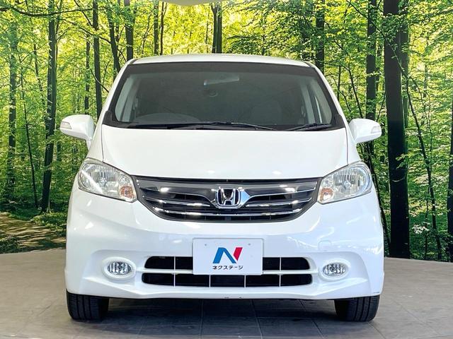 フリード G ジャストセレクション 後席モニター 電動スライドドア 禁煙車 ETC オートライト オートエアコン HIDヘッド 横滑防止装置 プライバシーガラス 盗難防止装置 キーレス(15枚目)