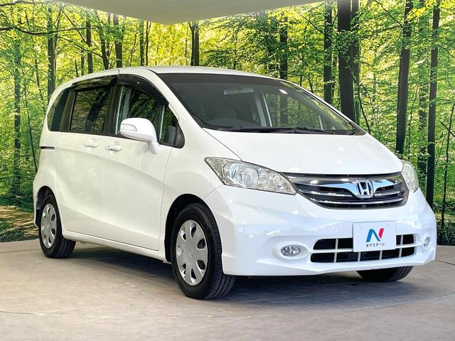 フリード G ジャストセレクション 後席モニター 電動スライドドア 禁煙車 ETC オートライト オートエアコン HIDヘッド 横滑防止装置 プライバシーガラス 盗難防止装置 キーレス(17枚目)